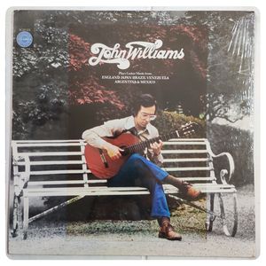 Plays Guitar Music From England Japan Brazil Venezuela Argentina & Mexico · John Williams